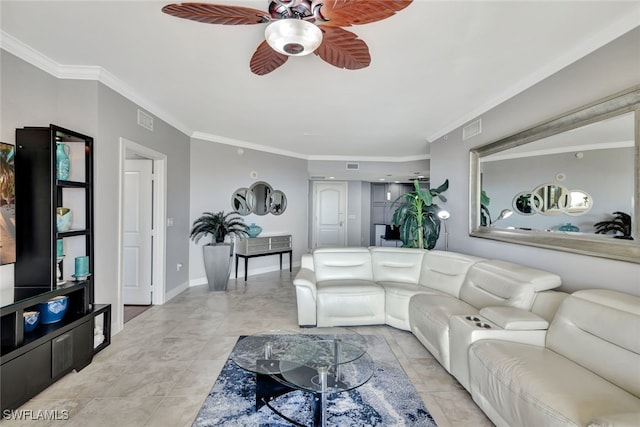 living room featuring crown molding, light tile patterned flooring, and ceiling fan