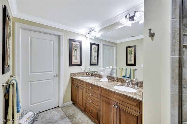 bathroom featuring ornamental molding, vanity, and tile patterned floors