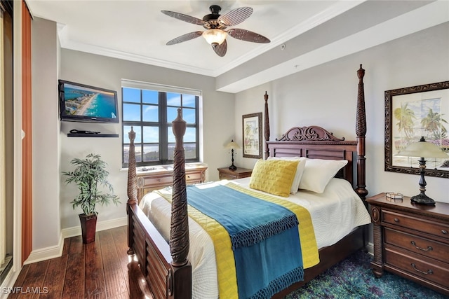 bedroom featuring crown molding, ceiling fan, and dark hardwood / wood-style floors