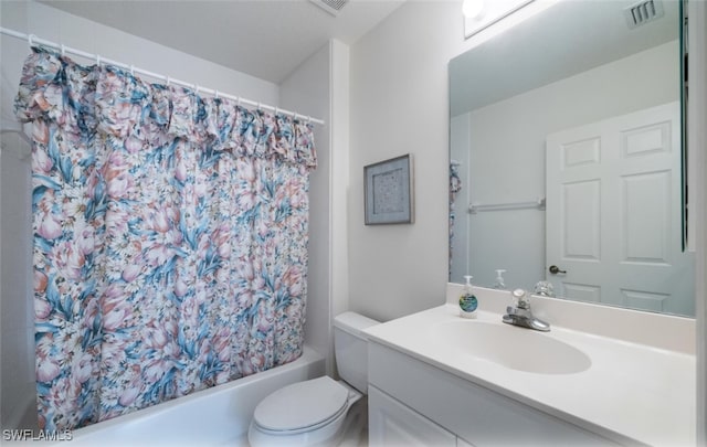 full bathroom featuring shower / bathtub combination with curtain, vanity, and toilet