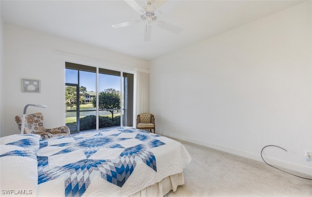 bedroom featuring access to exterior, carpet floors, and ceiling fan