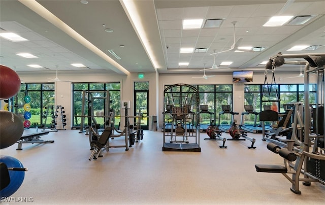 workout area with a drop ceiling