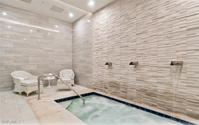 view of pool featuring an indoor in ground hot tub