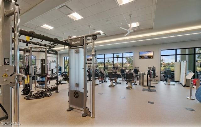 gym with visible vents and a drop ceiling