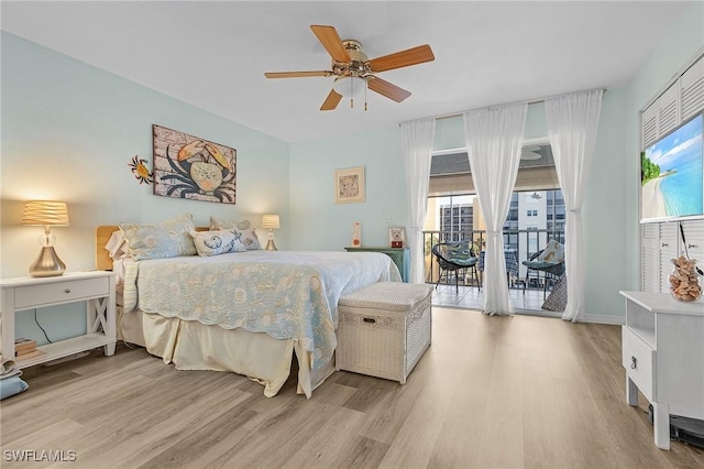 bedroom with access to outside, light hardwood / wood-style floors, and ceiling fan