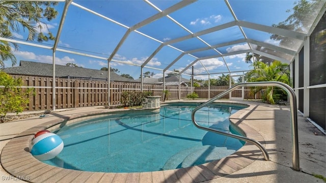 view of pool featuring a lanai, a fenced backyard, a fenced in pool, and a patio