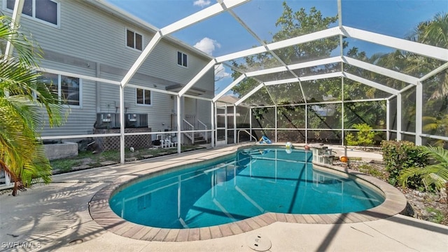 pool featuring a patio and a lanai