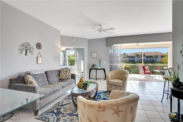 living room featuring ceiling fan and light tile patterned flooring