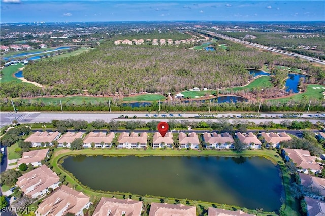 bird's eye view with a water view