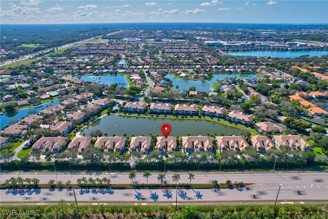 drone / aerial view featuring a water view