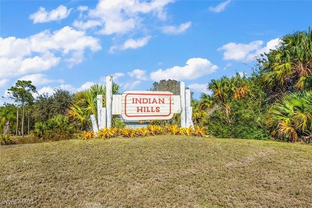 community sign with a yard