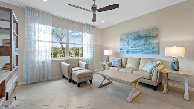 living room with light tile patterned floors and ceiling fan