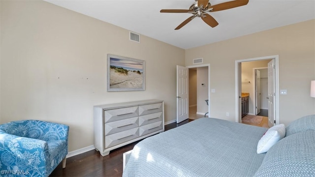 bedroom with dark hardwood / wood-style floors, ceiling fan, and ensuite bathroom