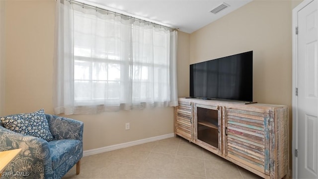 sitting room featuring light tile patterned floors