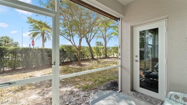 sunroom with plenty of natural light