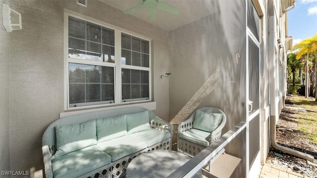 view of patio featuring ceiling fan