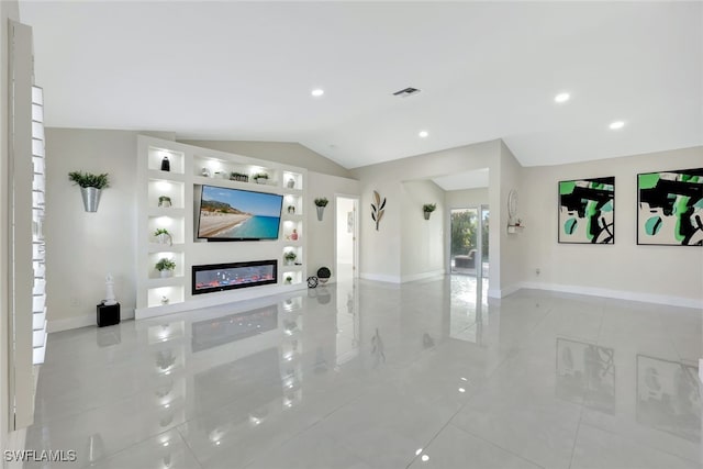 living room featuring lofted ceiling and built in features