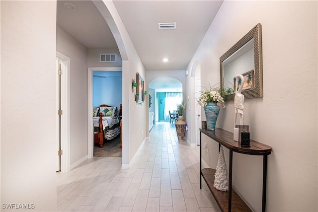 corridor featuring light hardwood / wood-style flooring