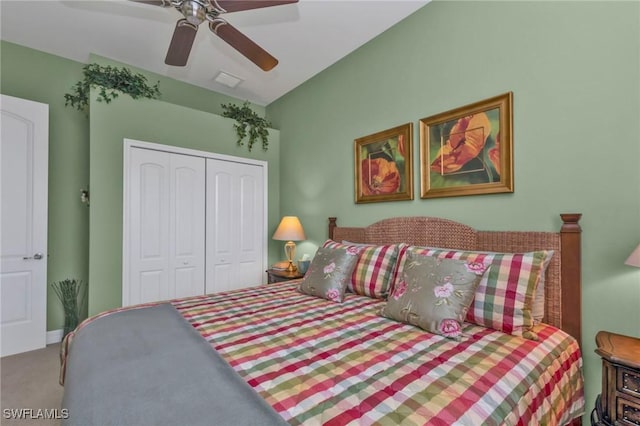 bedroom with a closet, ceiling fan, and carpet