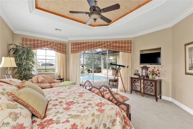 carpeted bedroom featuring a raised ceiling, crown molding, access to exterior, and ceiling fan