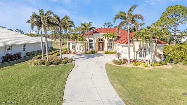 view of front of property with a front lawn