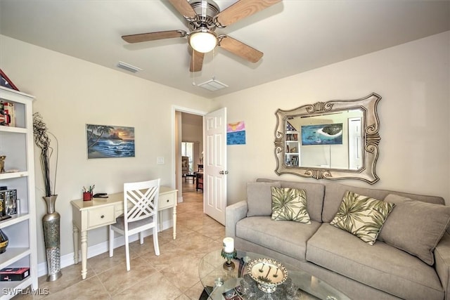 tiled living room with ceiling fan