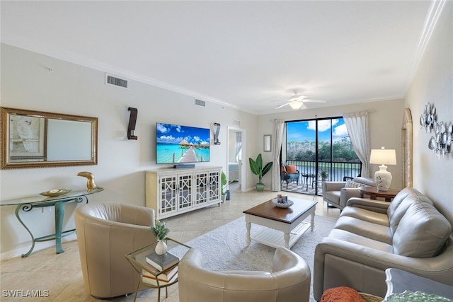 living area featuring ornamental molding, visible vents, ceiling fan, and baseboards