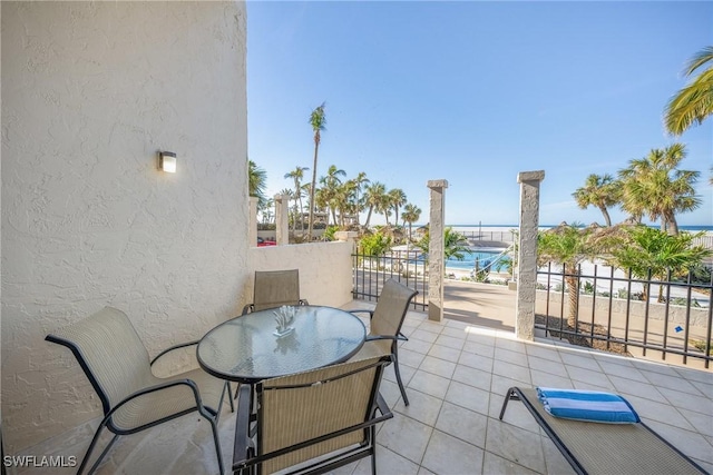 view of patio / terrace with a water view