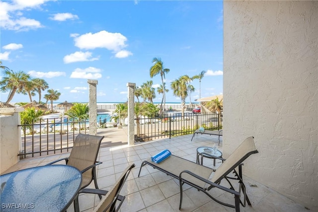 view of patio / terrace featuring fence