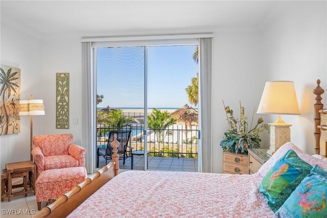 bedroom featuring access to outside and crown molding