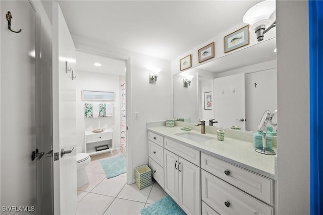 full bathroom with a shower with curtain, vanity, toilet, and tile patterned floors