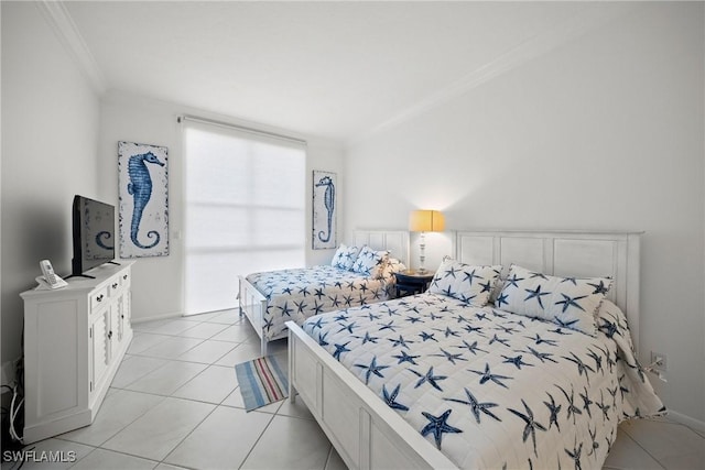 bedroom featuring crown molding and light tile patterned flooring