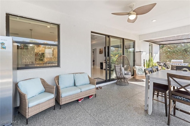 interior space featuring ceiling fan