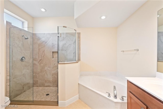 full bathroom with vanity, tile patterned flooring, plus walk in shower, and toilet