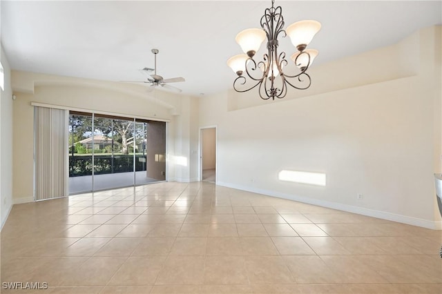 tiled empty room featuring ceiling fan with notable chandelier