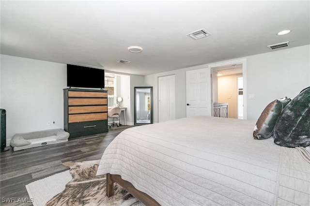 bedroom featuring dark wood-type flooring