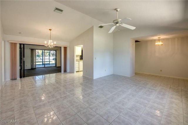 empty room featuring ceiling fan with notable chandelier, high vaulted ceiling, and light tile patterned floors