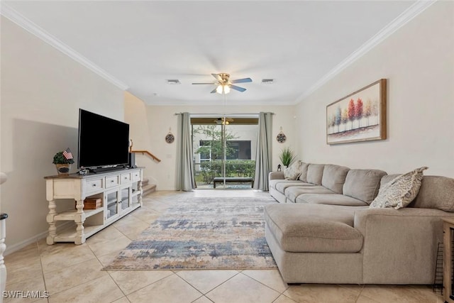 living room featuring ornamental molding, light tile patterned flooring, and ceiling fan