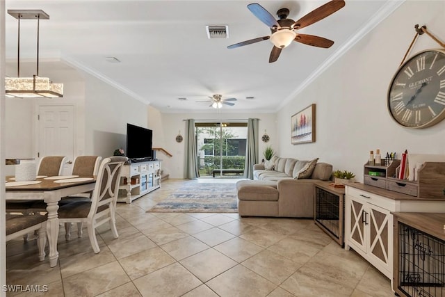 living room with crown molding, ceiling fan, and light tile patterned flooring