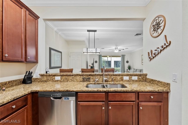 kitchen featuring dishwasher, sink, and light stone counters