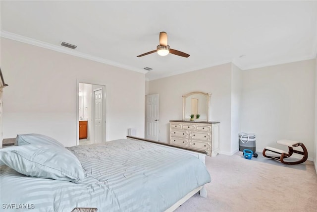 carpeted bedroom with ornamental molding and ceiling fan