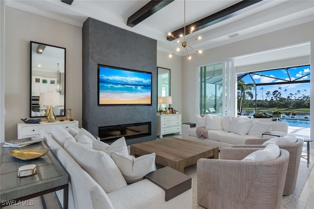 living room with a chandelier, a large fireplace, and beamed ceiling