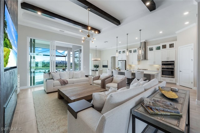 tiled living room with an inviting chandelier, beam ceiling, and ornamental molding