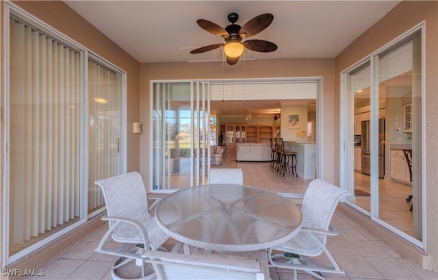 9269 Coach House Ln, Estero, FL 33928 - sunroom with tile patterned flooring