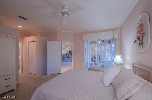 bedroom featuring light carpet, crown molding, and ceiling fan