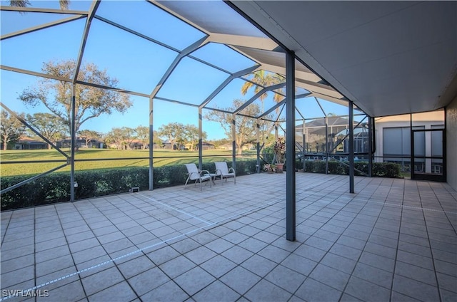 view of patio / terrace with a lanai