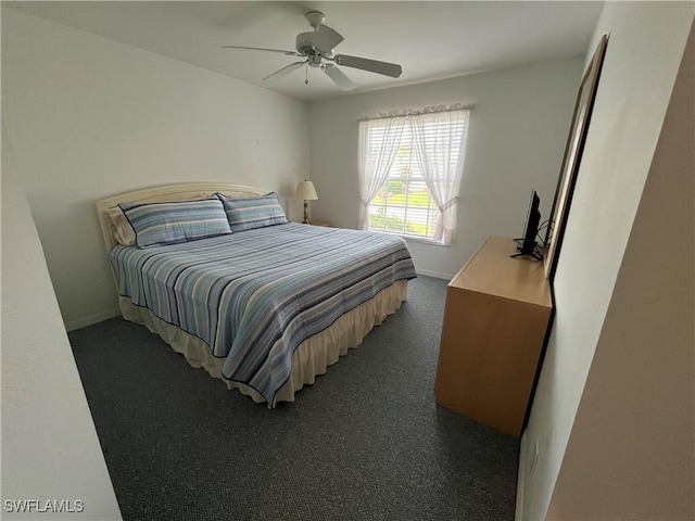 9269 Coach House Ln, Estero, FL 33928 - bedroom featuring baseboards, ceiling fan, and dark carpet
