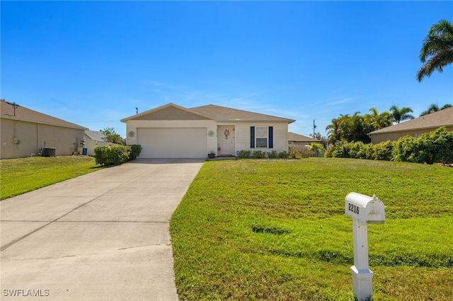 single story home with a front yard and a garage