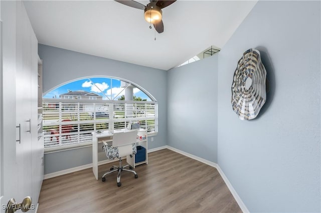 office featuring lofted ceiling, wood-type flooring, and ceiling fan