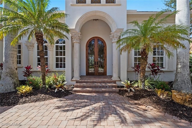 view of exterior entry with french doors